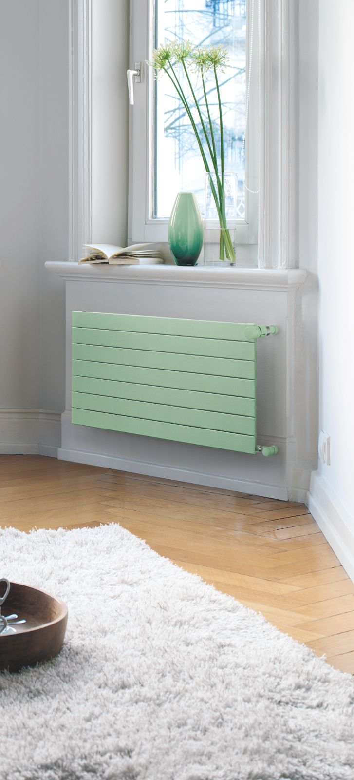 Zehnder_RAD-Nova-milieu-livingroom_PastelGreen Rendering Zehnder Nova Decorative radiator Angled view