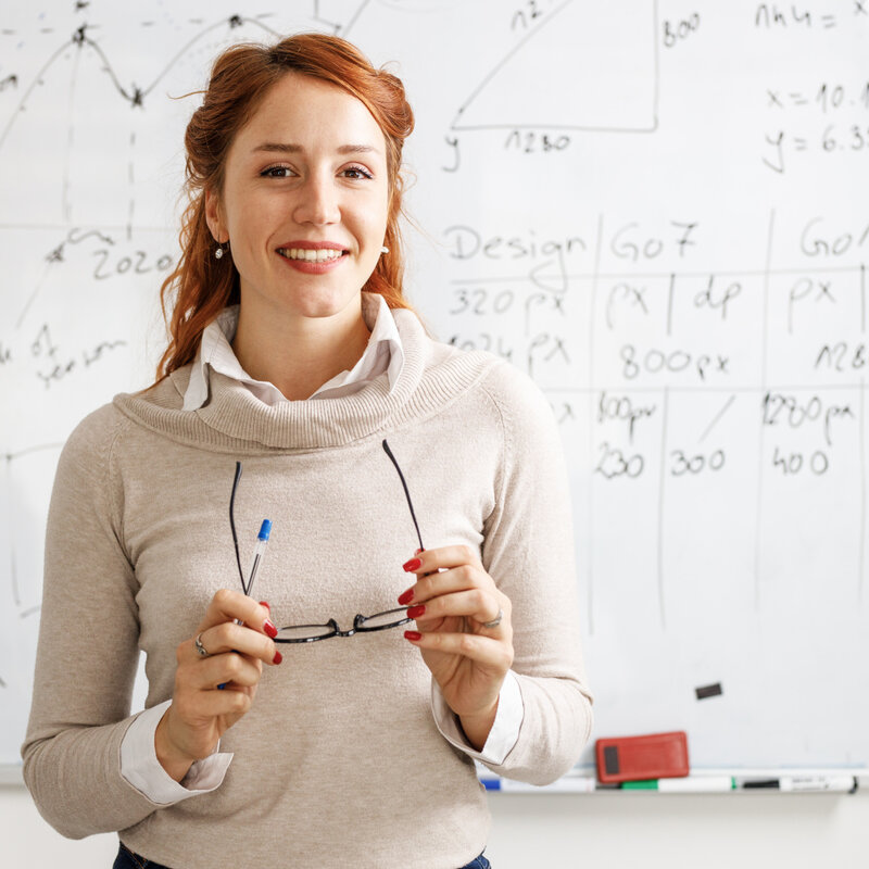 Smiling female professor giving a lesson about science facts of the HVAC world